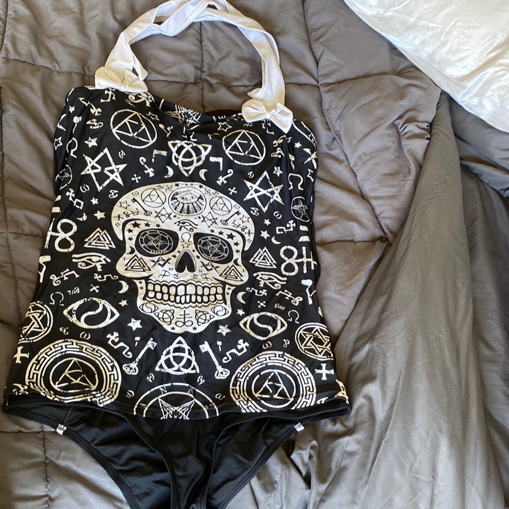 Hot topic sugar skull one piece bathing suit.